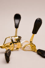 Load image into Gallery viewer, Bright, open eyes start here! The DARCYMM #CURLPOWER LASH CURLER is the perfect combination of function and style. Mascara only does half the job. The lash curler is an essential beauty tool for eyes that pop. This tool is the most inexpensive way to make lashes look instantly longer. Eyes will look more feminine, awake, and open when lashes are curled. The #CURLPOWER LASH CURLER will curl even the most stubborn lashes in seconds.